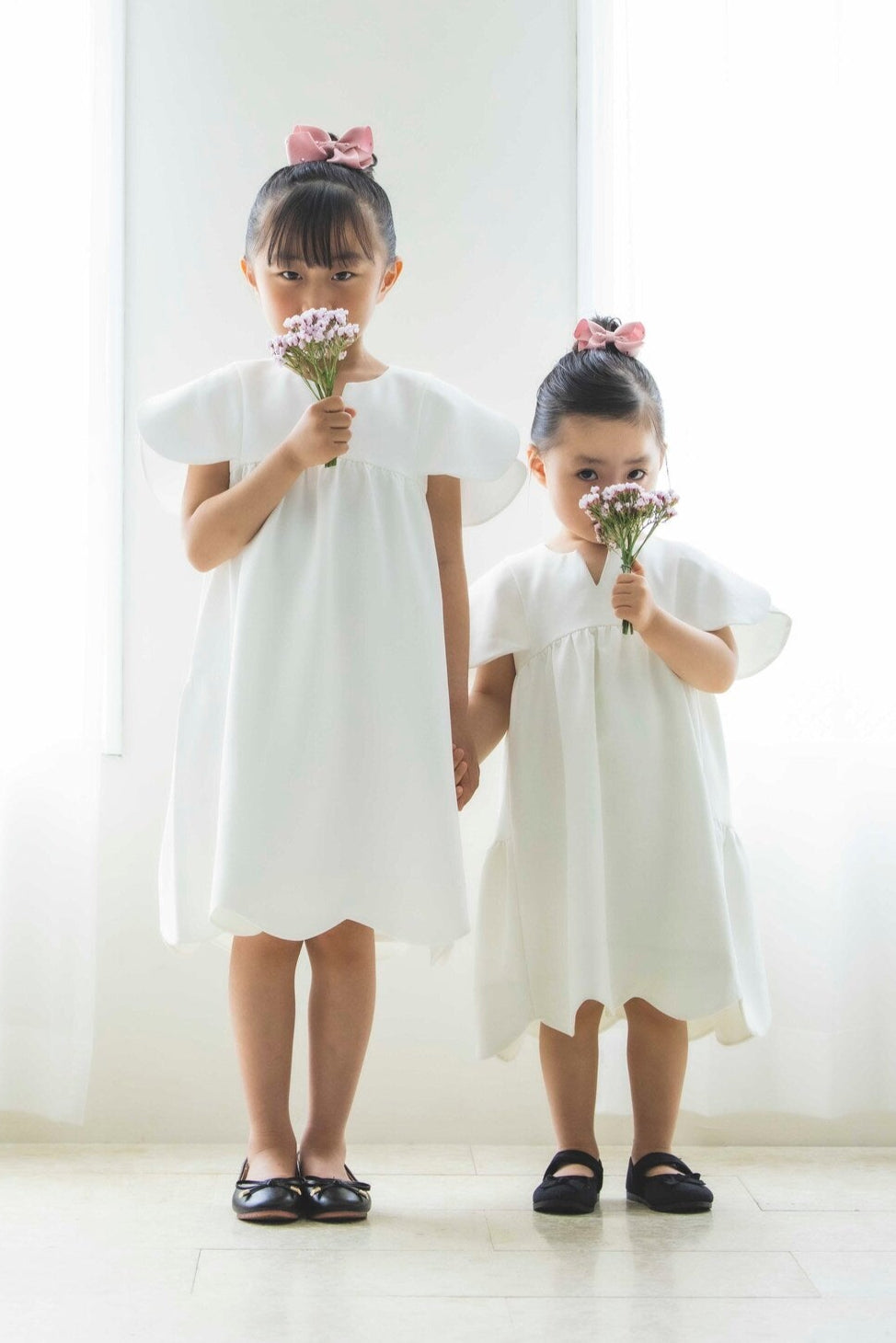 左:110cm | 120サイズ着用,右:90cm | 100サイズ着用